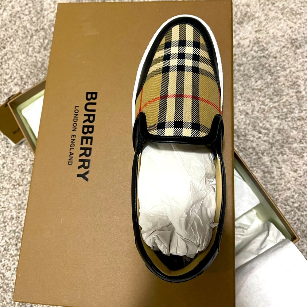 Never worn Burberry slip ons. Size 36.